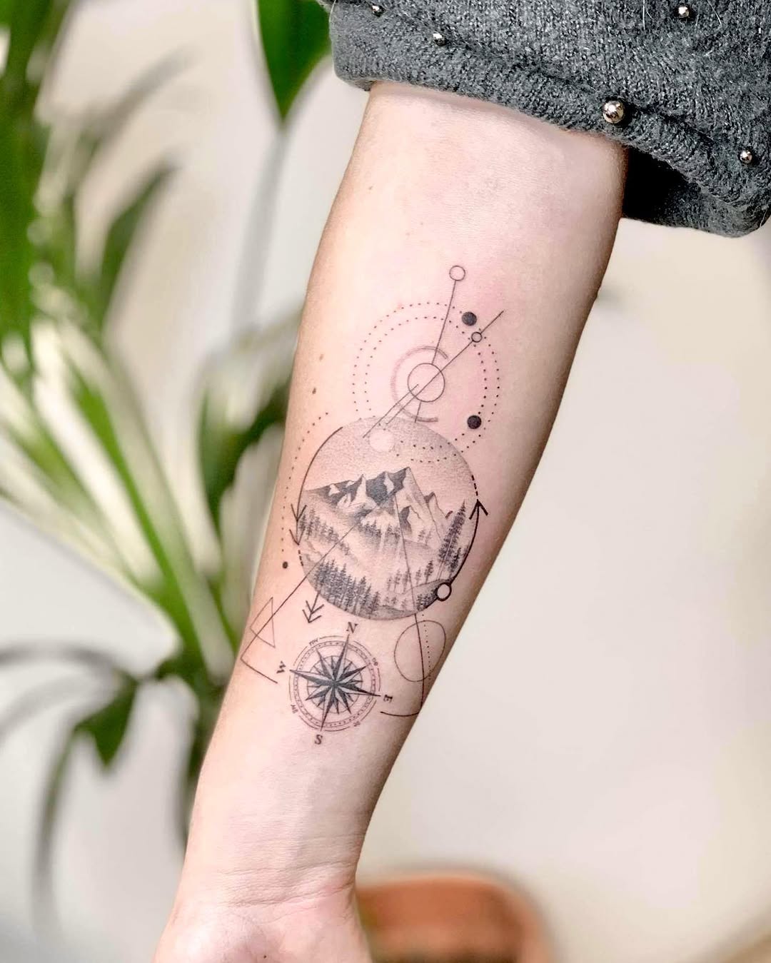 Geometric dotwork tattoo